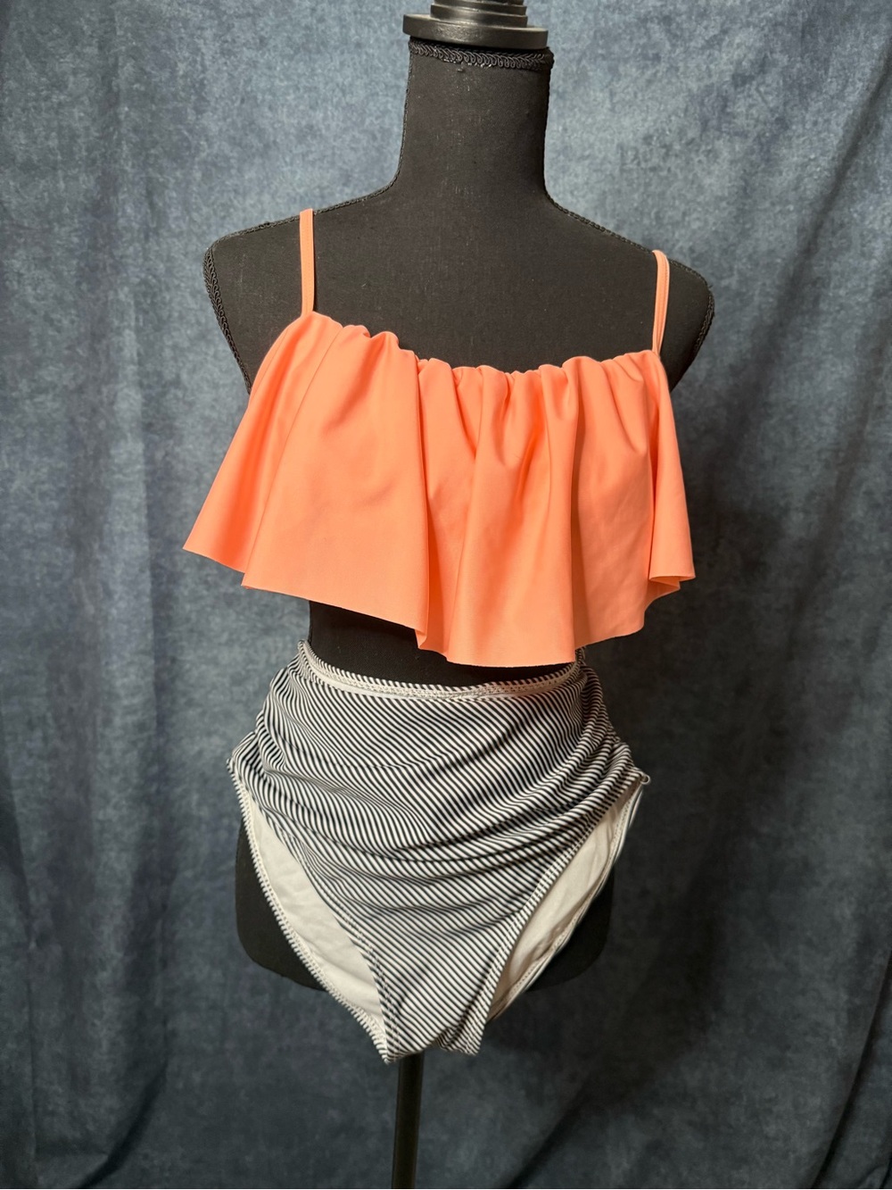 Ruffled Coral Bikini Top with striped bottoms